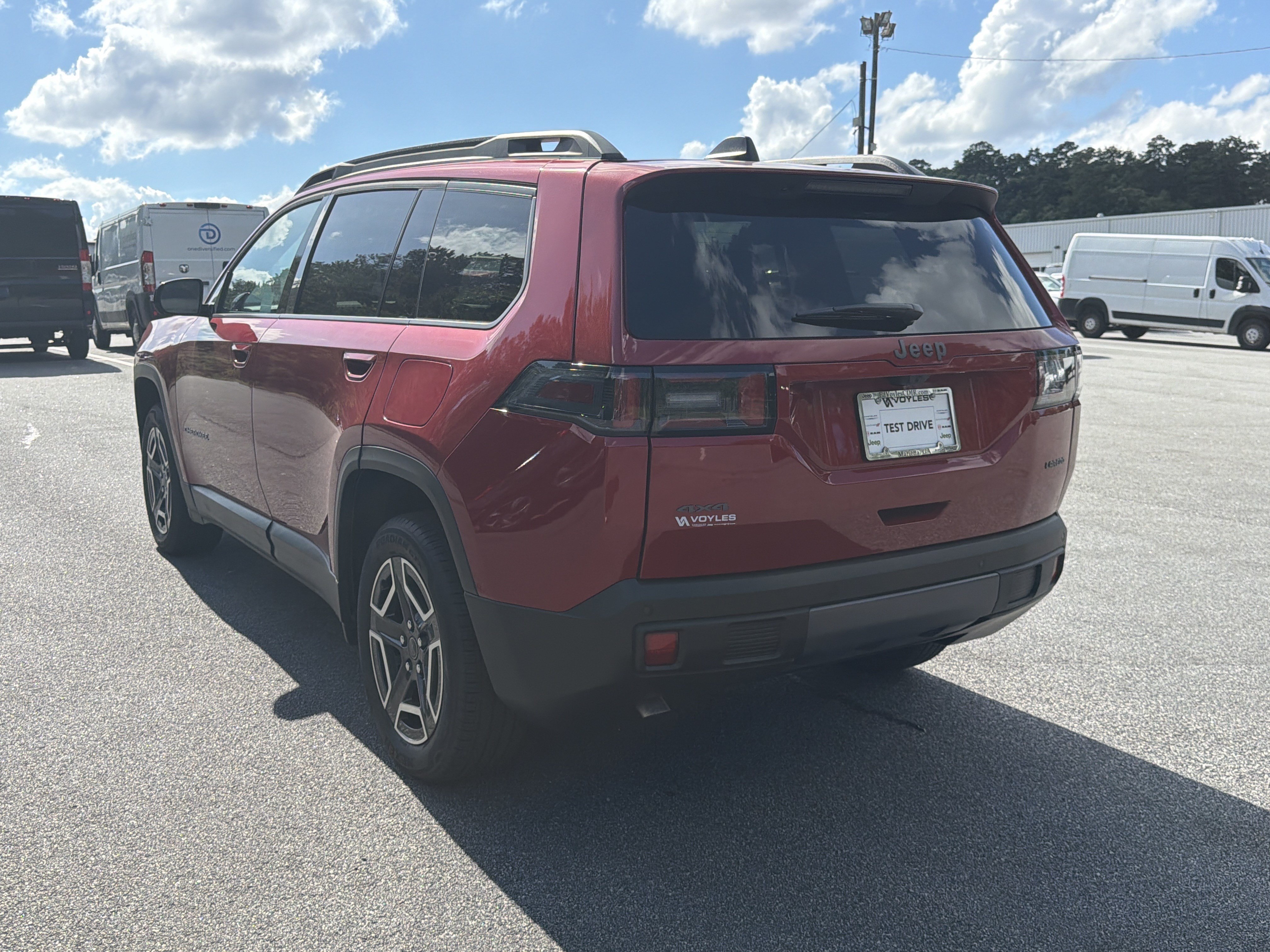 New 2026 Red Hot Pearlcoat Jeep Laredo image 6