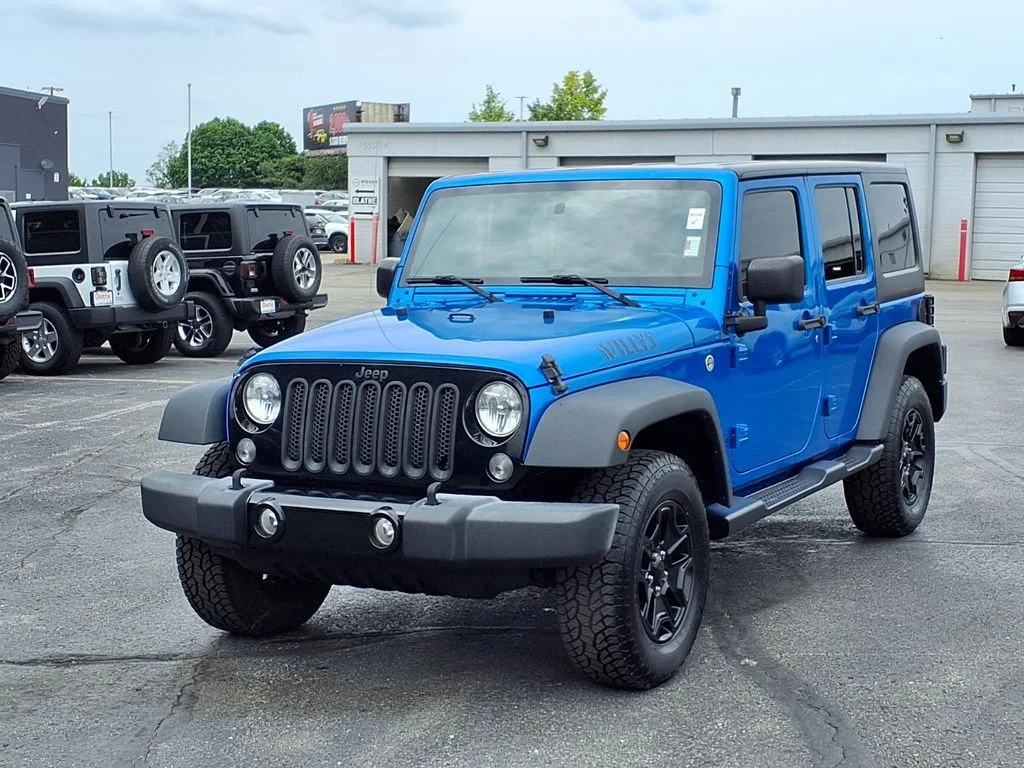 Used 2016 Blue Jeep Unlimited Sport image 2