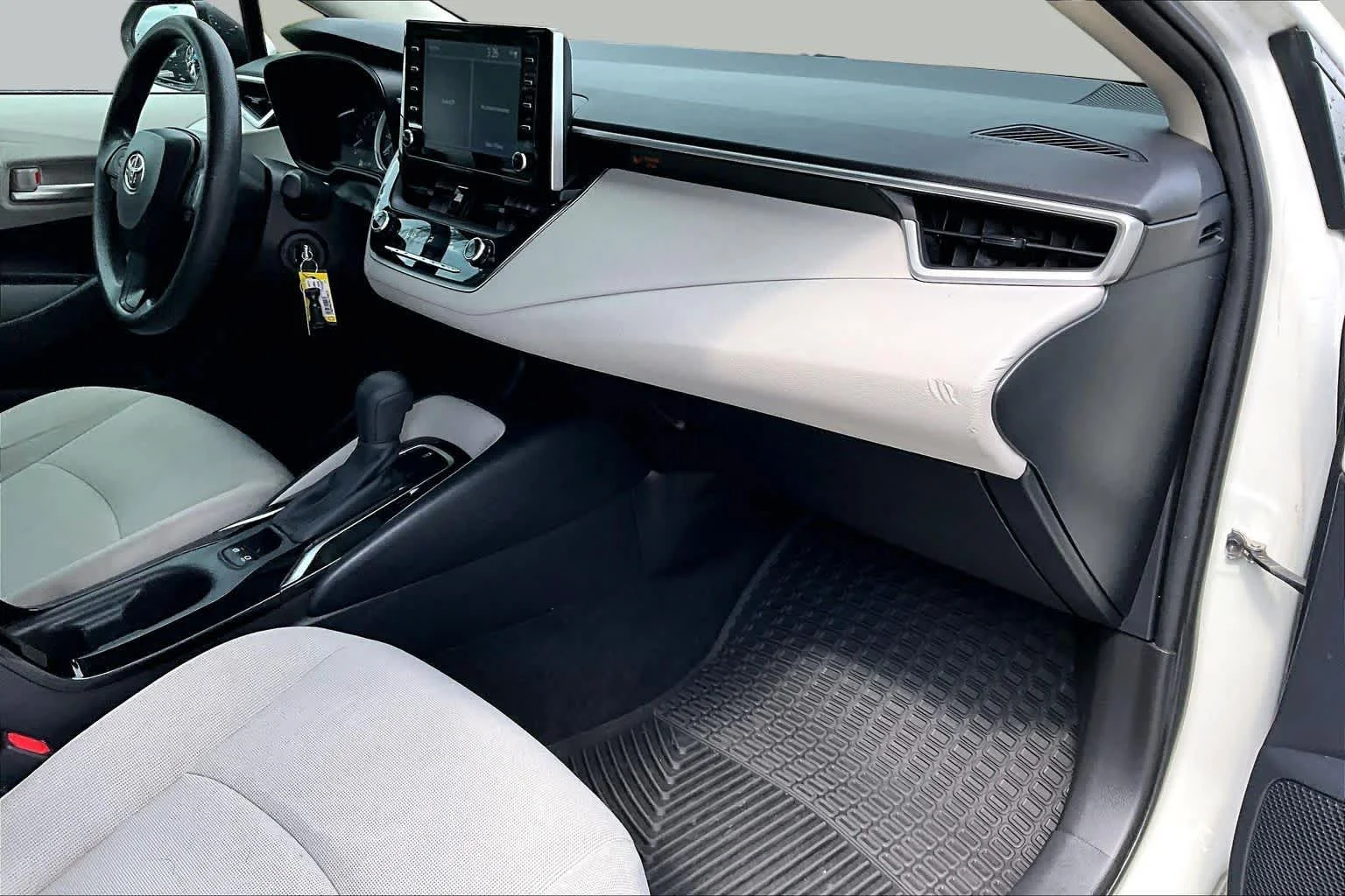 Used 2021 Super White Toyota LE image 19