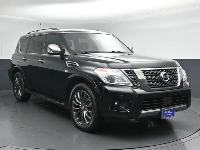 Certified Used 2020 Black Nissan Platinum image 1