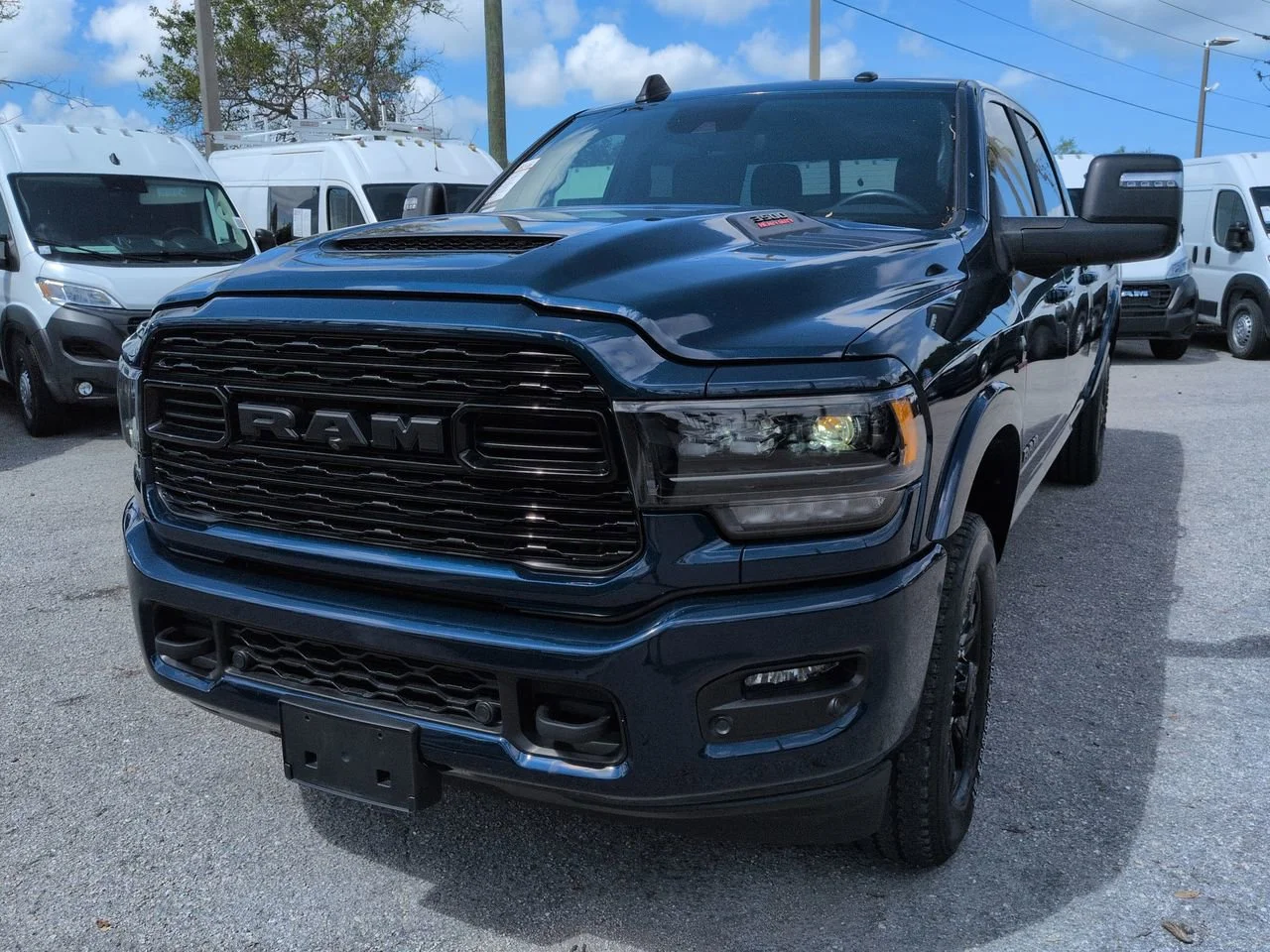 Used 2024 Patriot Blue Pearlcoat Ram Limited image 9