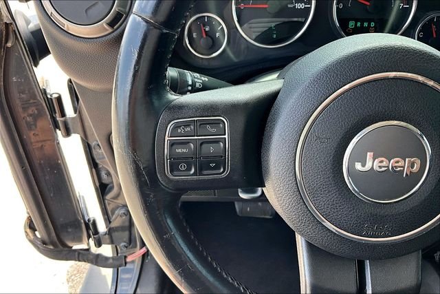 Used 2013 Black Jeep Unlimited Sport image 14