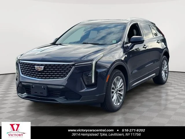 Used 2024 Black Cadillac Premium Luxury image 1