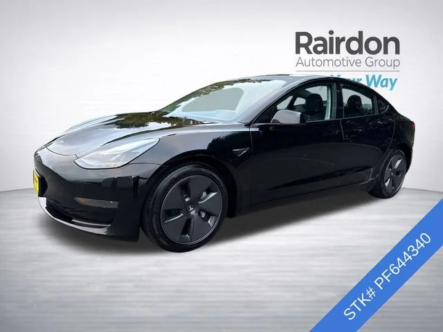 Used 2023 Solid Black Tesla Base image 3