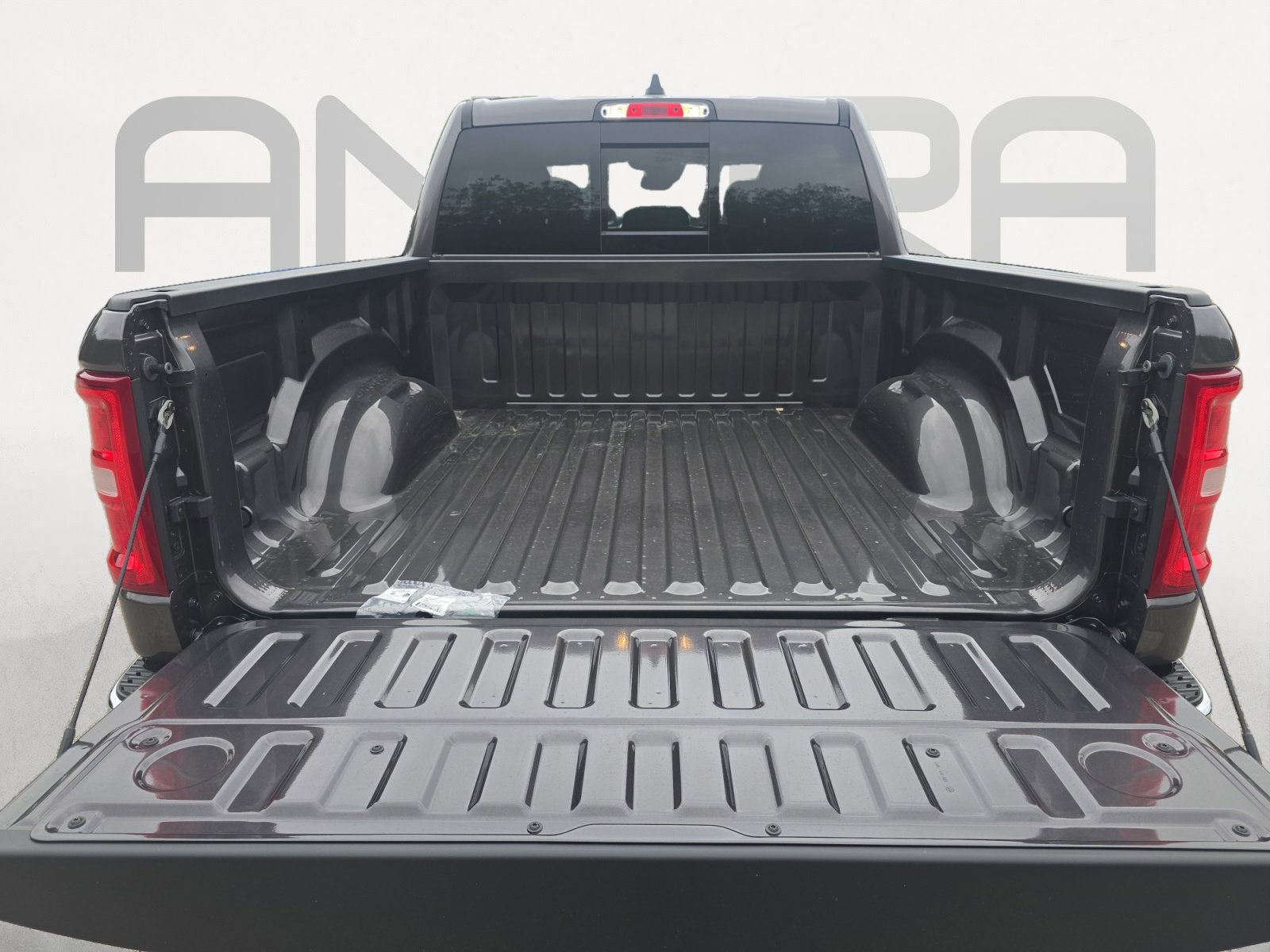 New 2026 Granite Crystal Metallic Clearcoat RAM Lone Star image 12