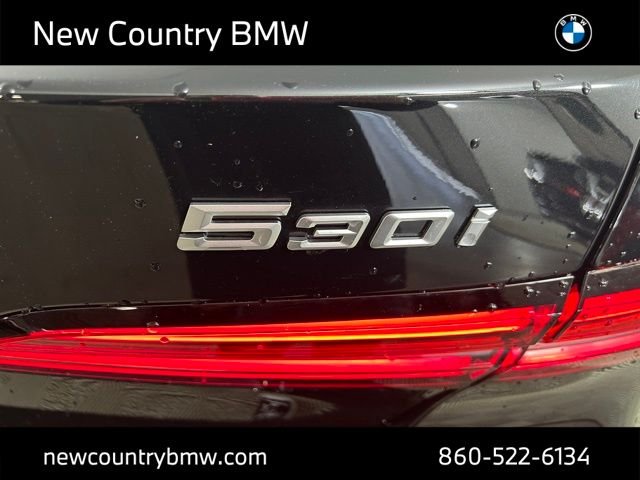 New 2027 Black Sapphire Metallic BMW 550e xDrive image 11