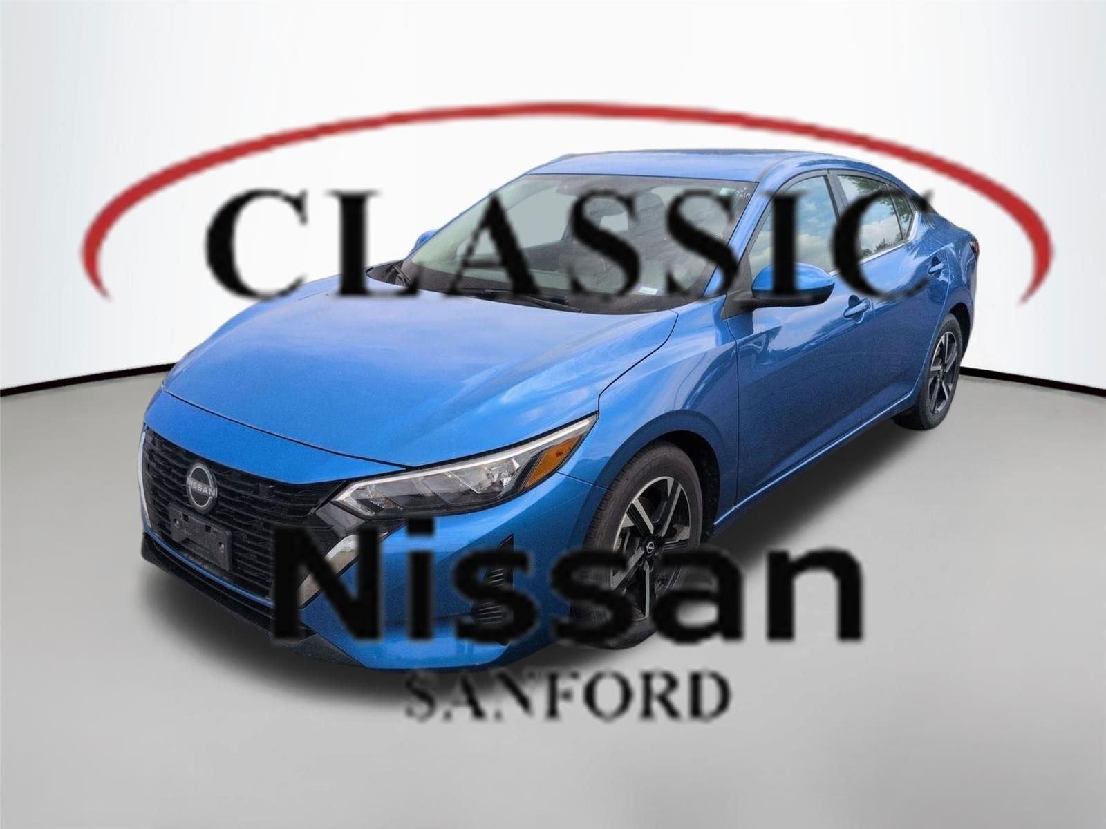 Used 2024 Electric Blue Metallic Nissan SV image 1