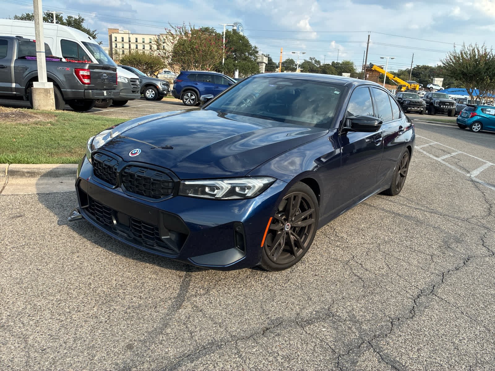Used 2023 Tanzanite Blue II Metallic BMW M340i image 2