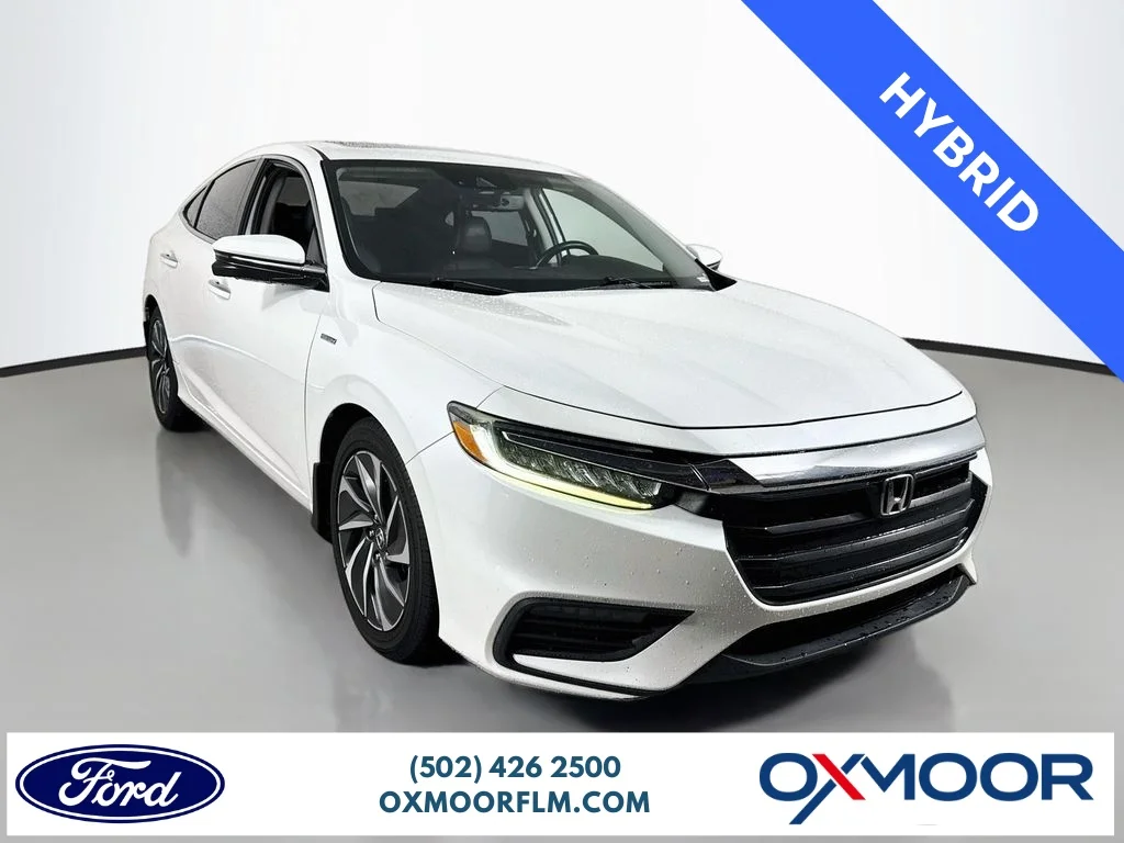 Used 2019 White Orchid Pearl Honda Touring image 1