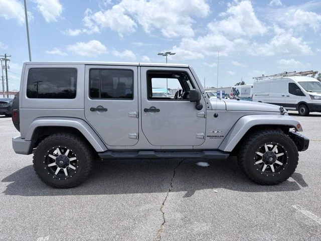 Used 2016 Silver Jeep Unlimited Sahara image 2