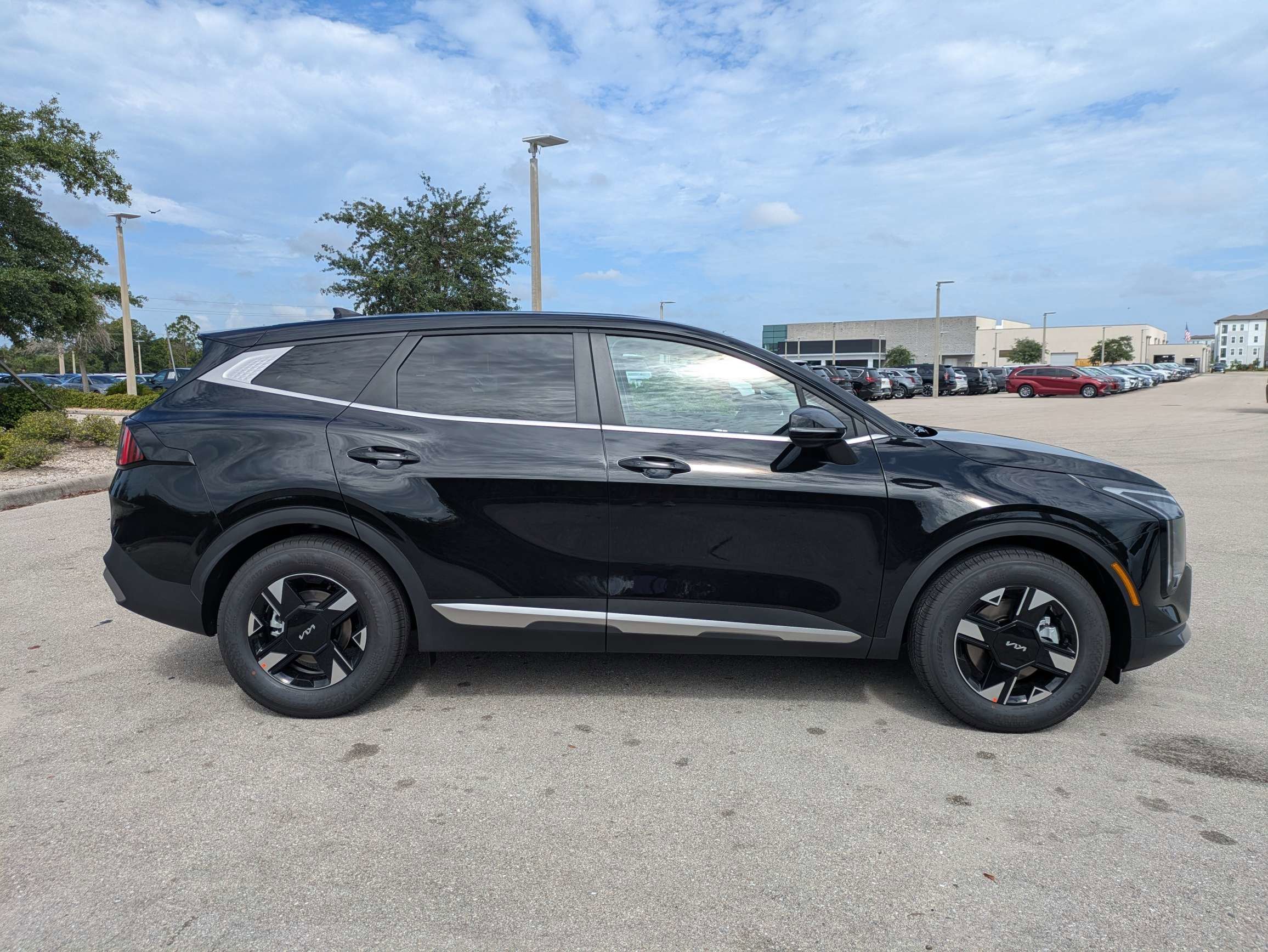New 2026 Ebony Black Kia LX image 4