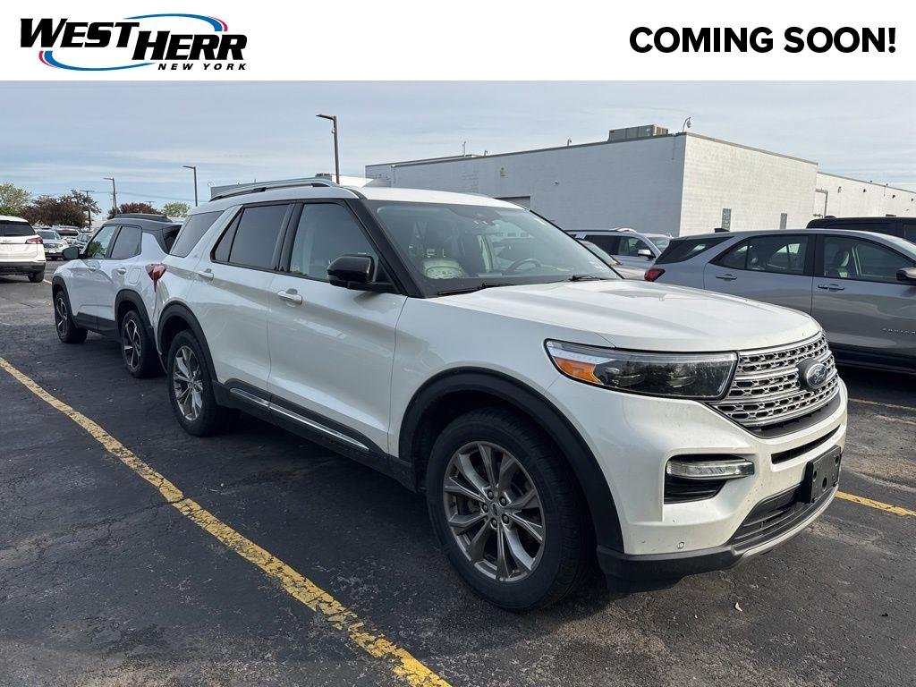 Used 2022 White Metallic Ford Limited image 1