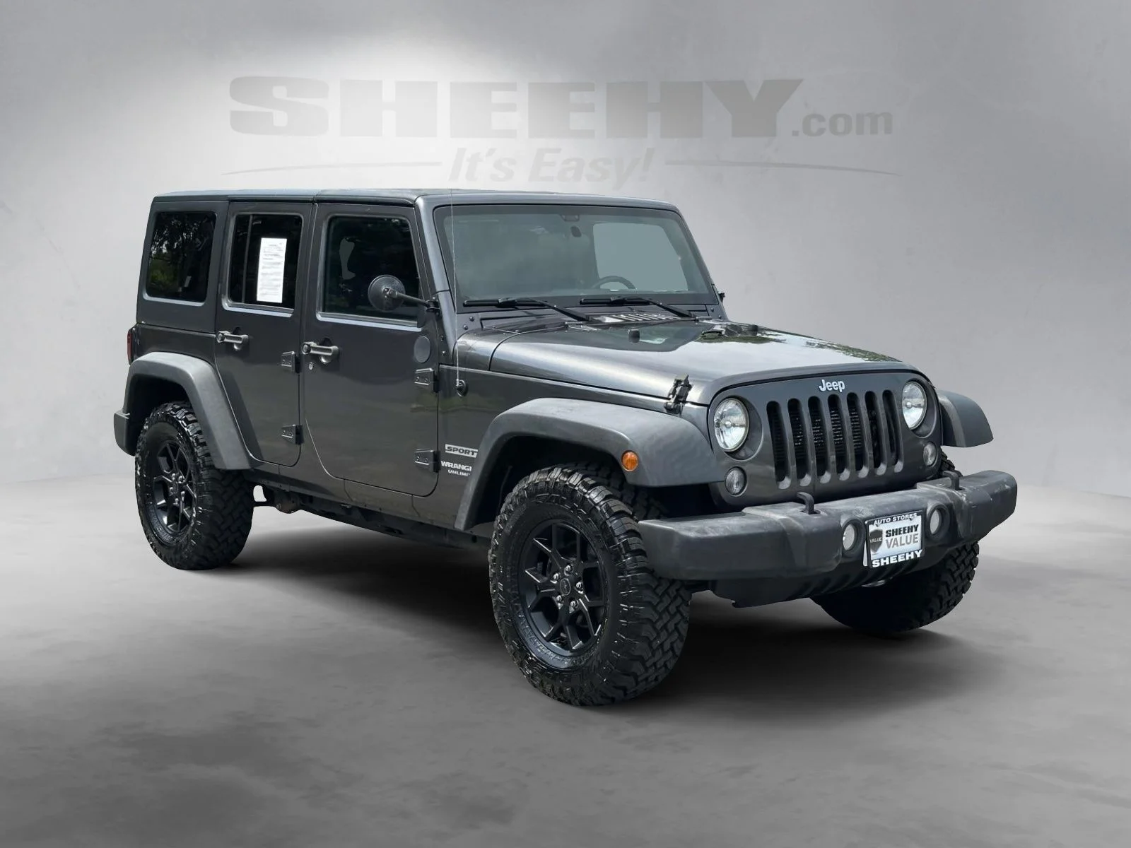 Used 2017 Gray Jeep Unlimited Sport image 2