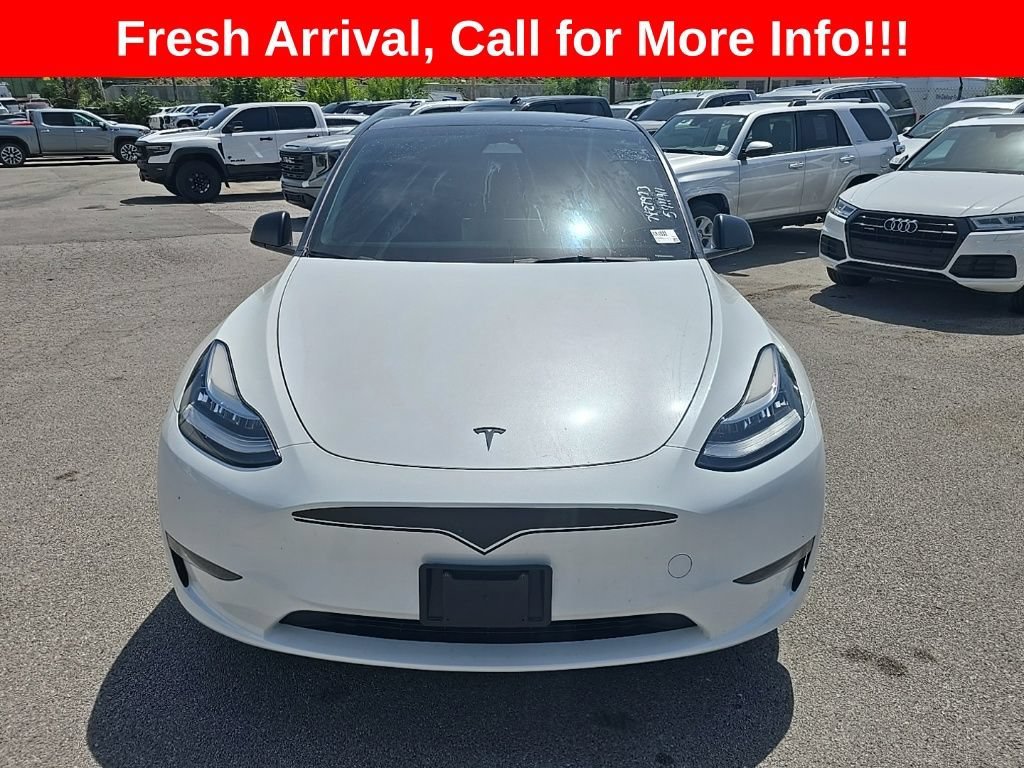 Used 2023 Tesla Model Y Long Range with VIN 7SAYGDEEXPA083328 for sale in Kansas City, MO