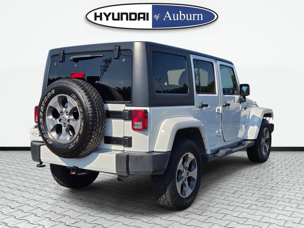 Used 2016 White Jeep Unlimited Sahara image 6