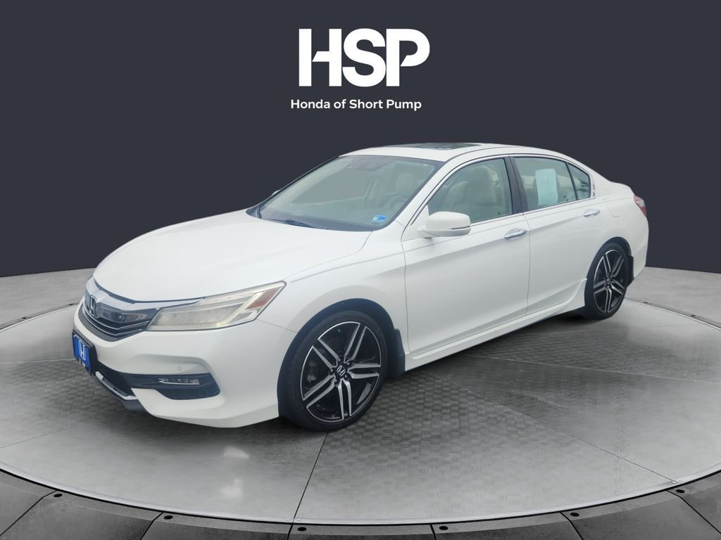 Used 2017 White Orchid Pearl Honda Touring image 1