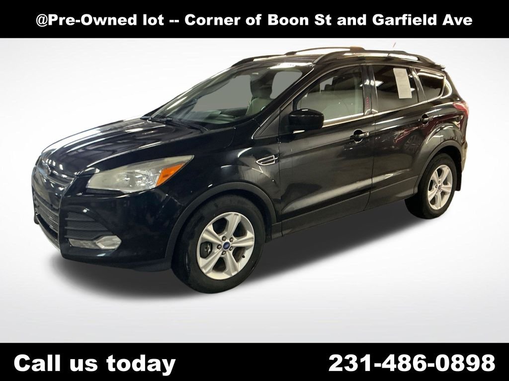 Used 2013 Black Ford SE image 1