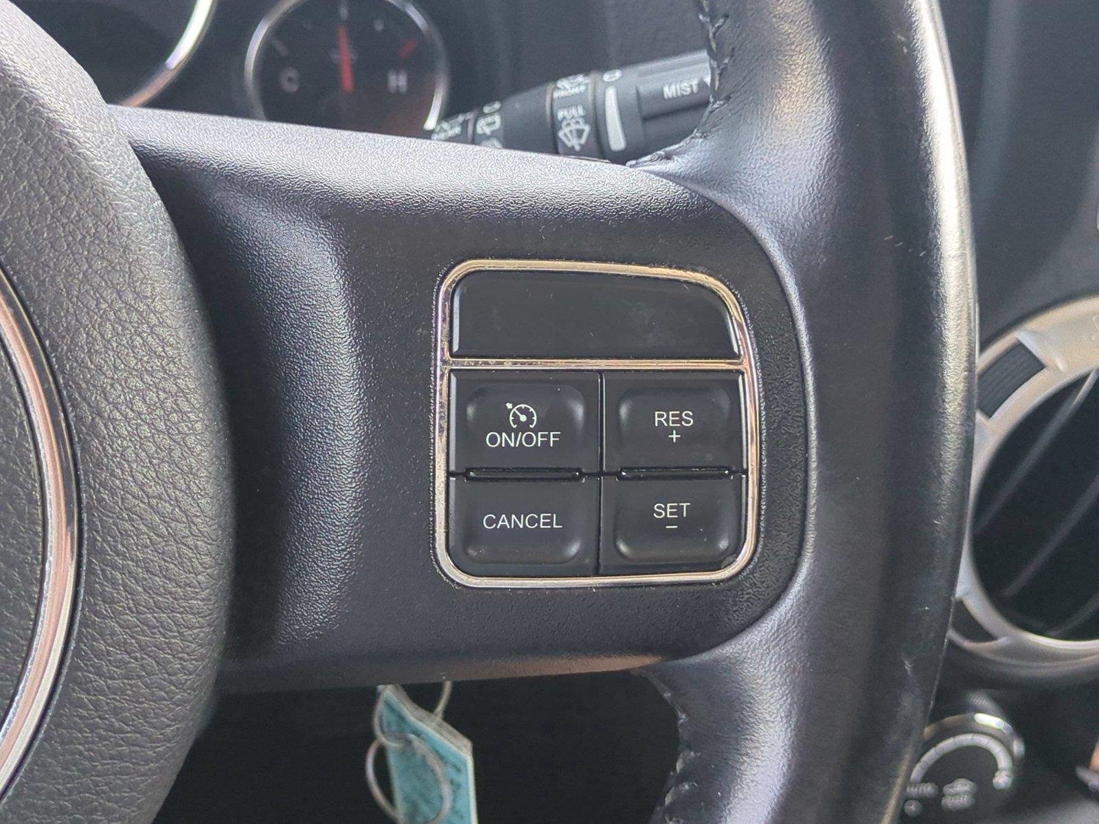 Used 2012 Black Clearcoat Jeep Sahara image 19