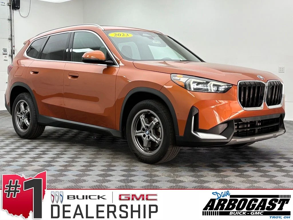 Used 2023 Utah Orange Metallic BMW xDrive28i image 1