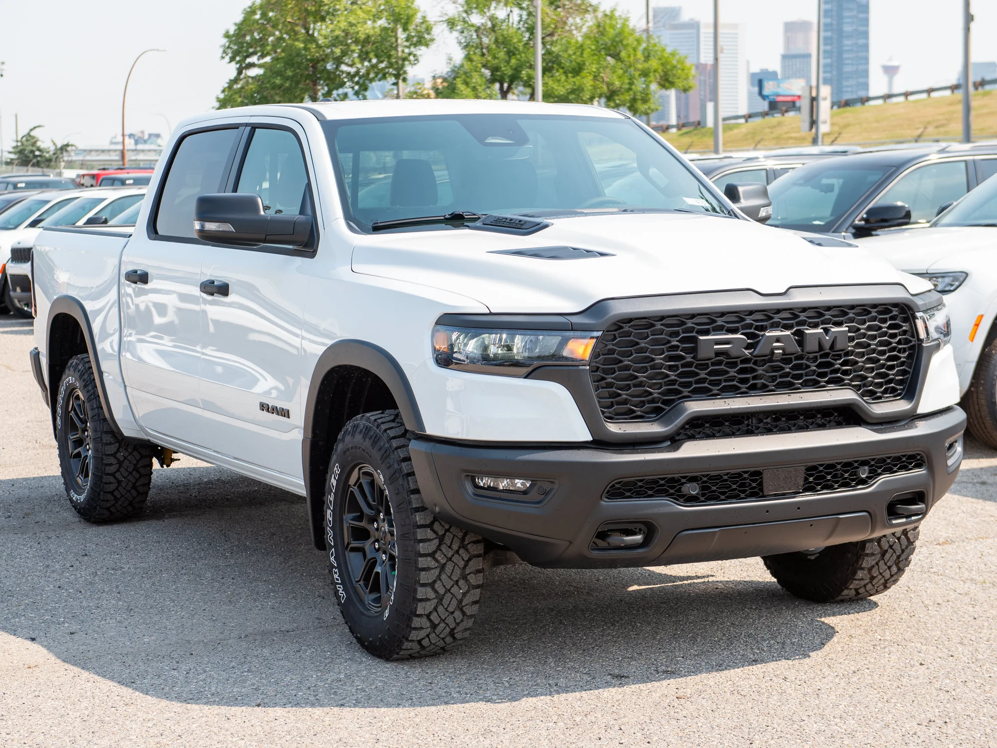 New 2026 White RAM Rebel* Crew Cab 4x4, 33 Inch A/T Tires, Factory Suspension Lift, Bilstein Shocks image 10