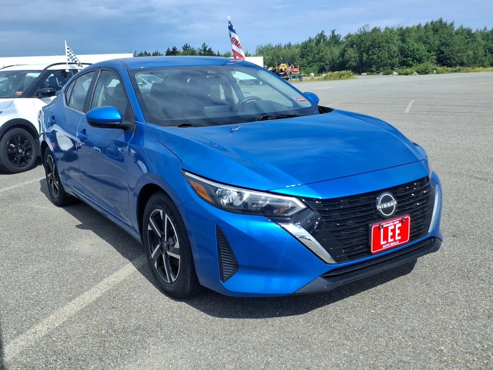 Used 2025 Electric Blue Metallic Nissan SV image 3