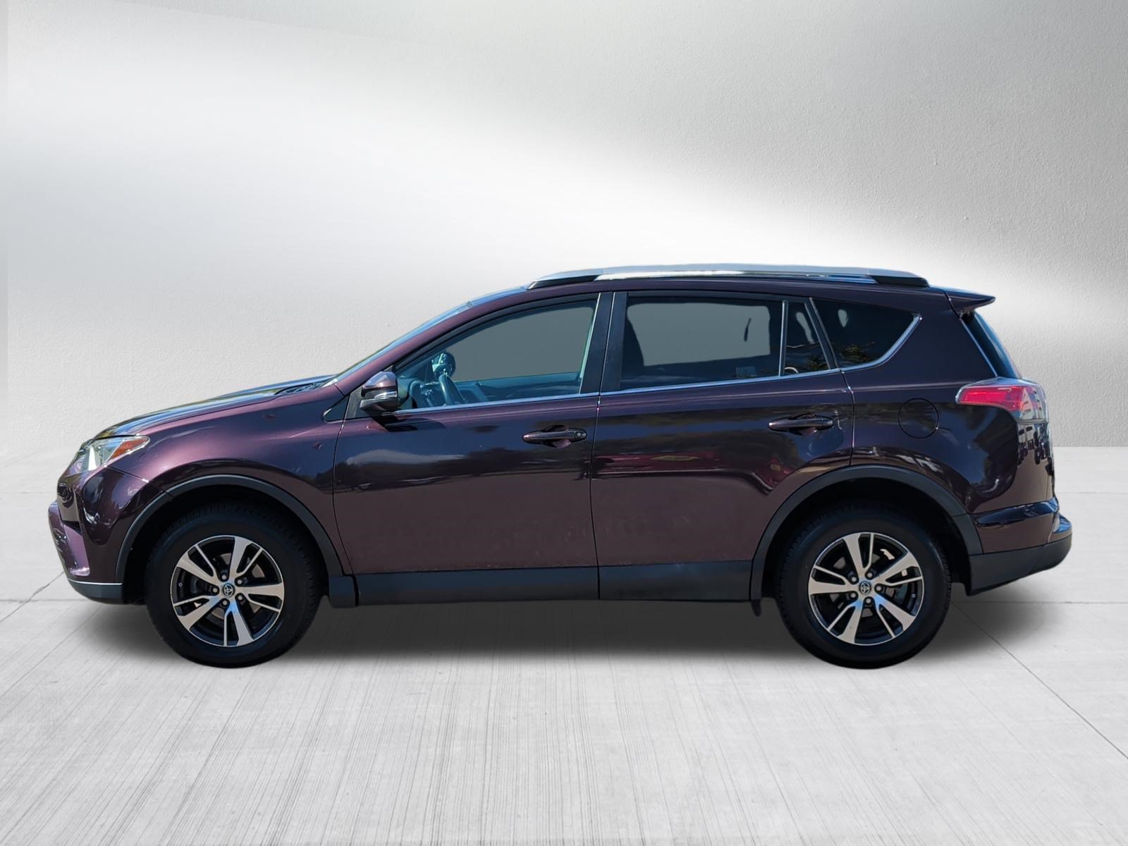 Used 2016 Black Currant Metallic Toyota XLE image 4
