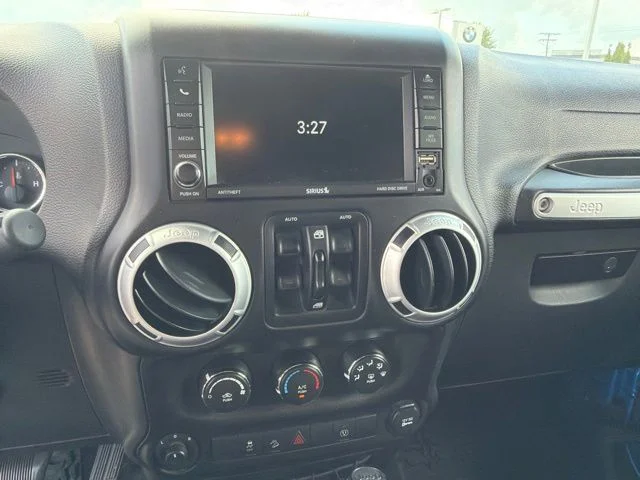 Used 2016 Blue Jeep Unlimited Sahara image 16