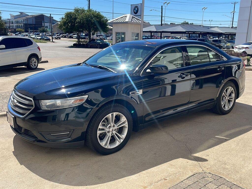 Used 2014 Dark Side Metallic Ford SEL image 1