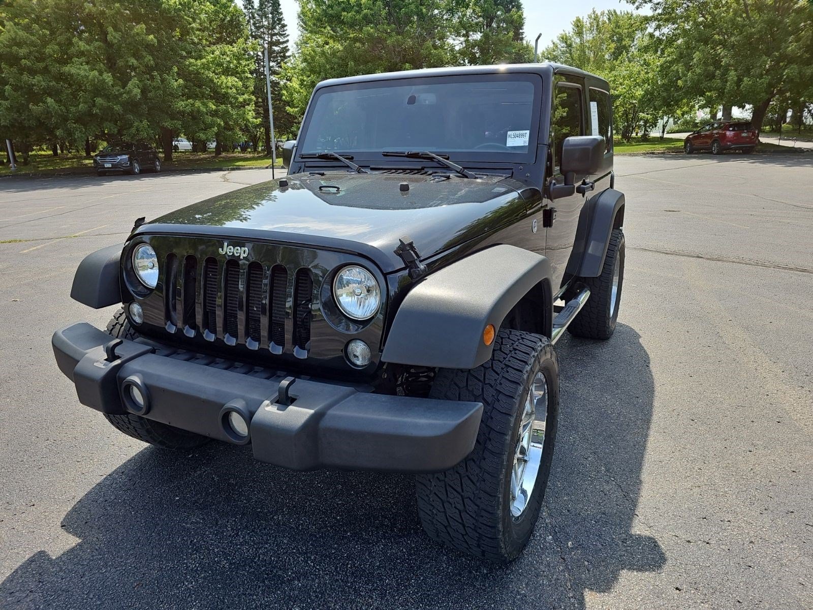 Used 2017 Black Clearcoat Jeep Sport image 2