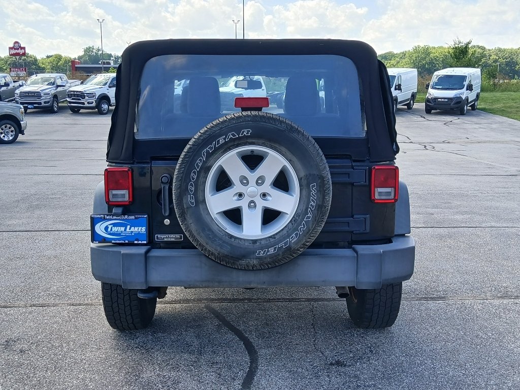 Used 2015 Black Clearcoat Jeep Sport image 7