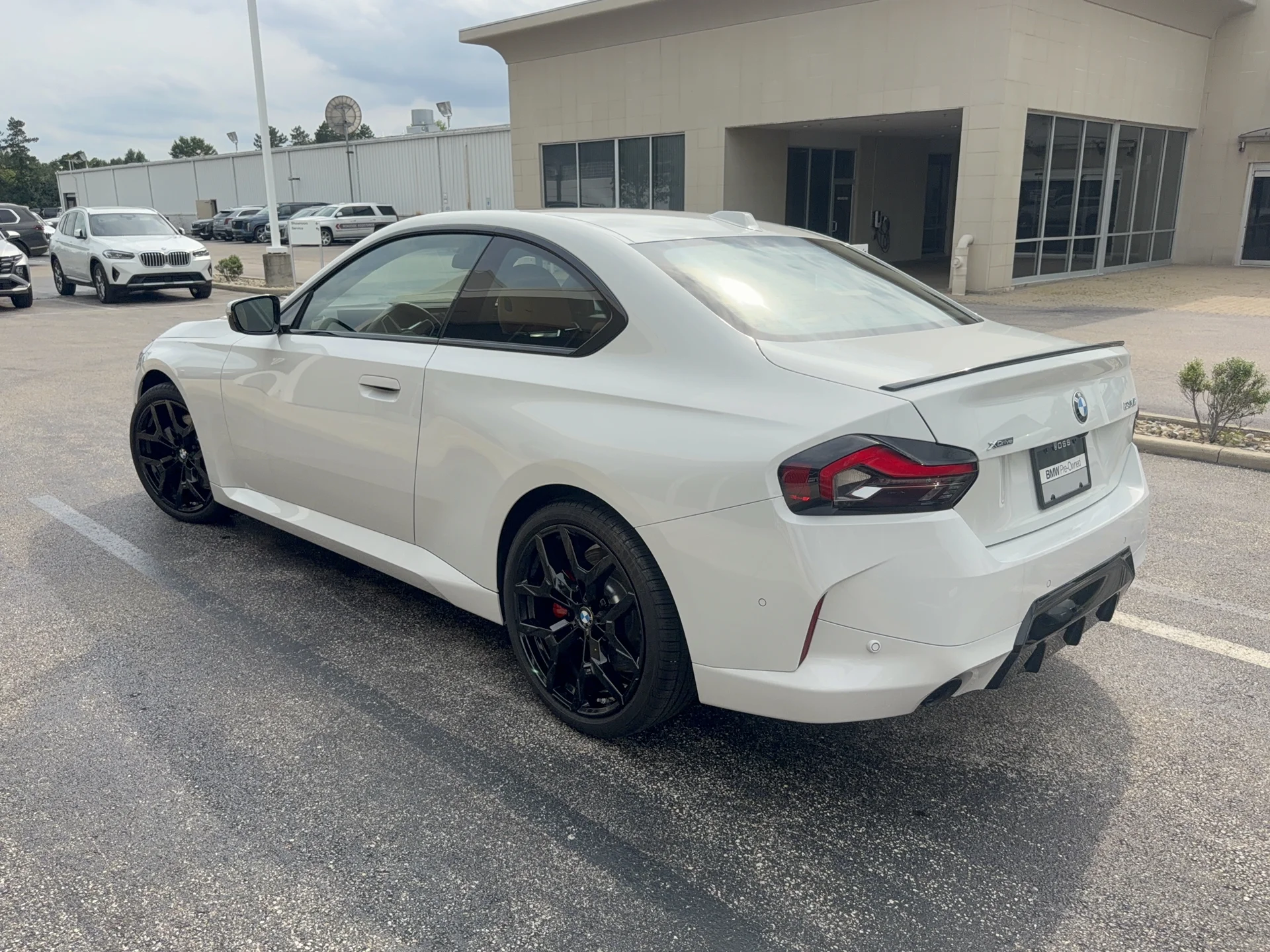 Used 2025 Alpine White BMW 230i xDrive image 6