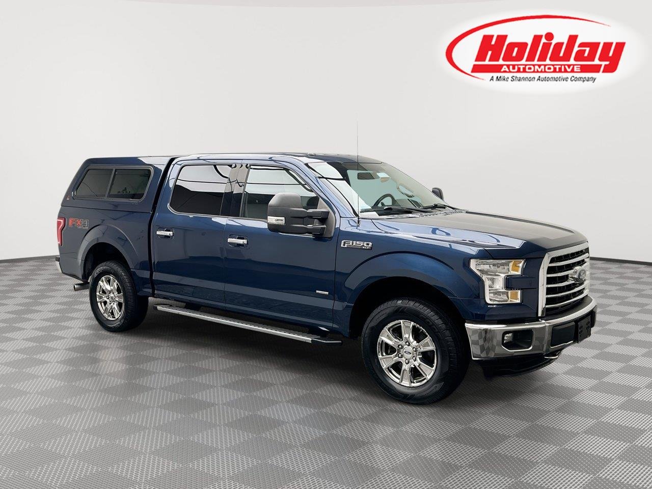 Used 2016 Blue Jeans Metallic Ford XLT image 1