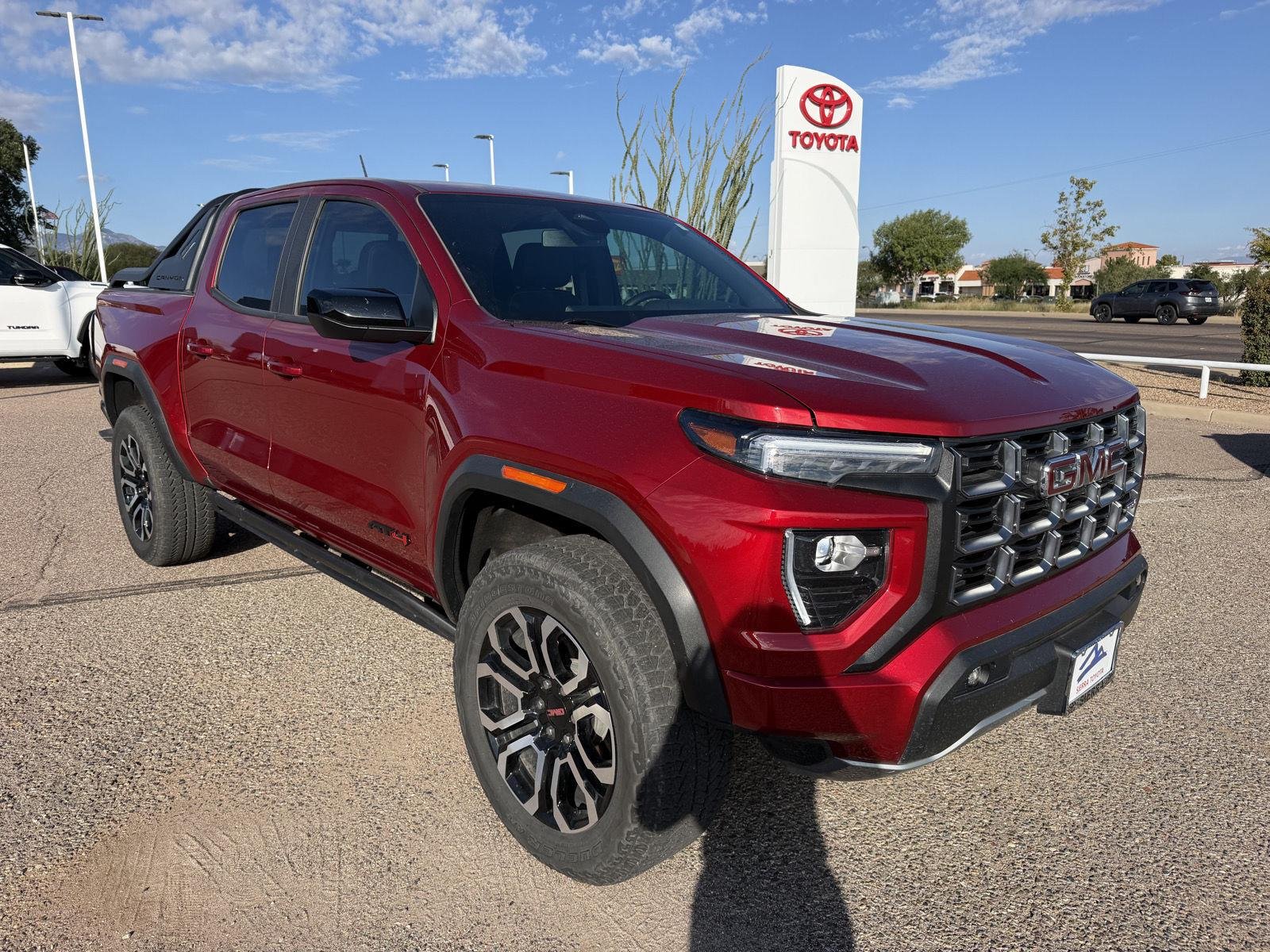 Used 2025 Volcanic Red Tintcoat GMC 4WD AT4 image 8