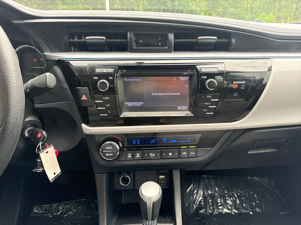 Used 2016 Classic Silver Metallic Toyota LE image 18