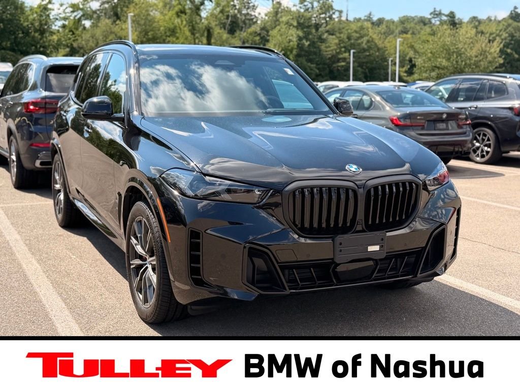Used 2026 Black Sapphire Metallic BMW xDrive40i image 1