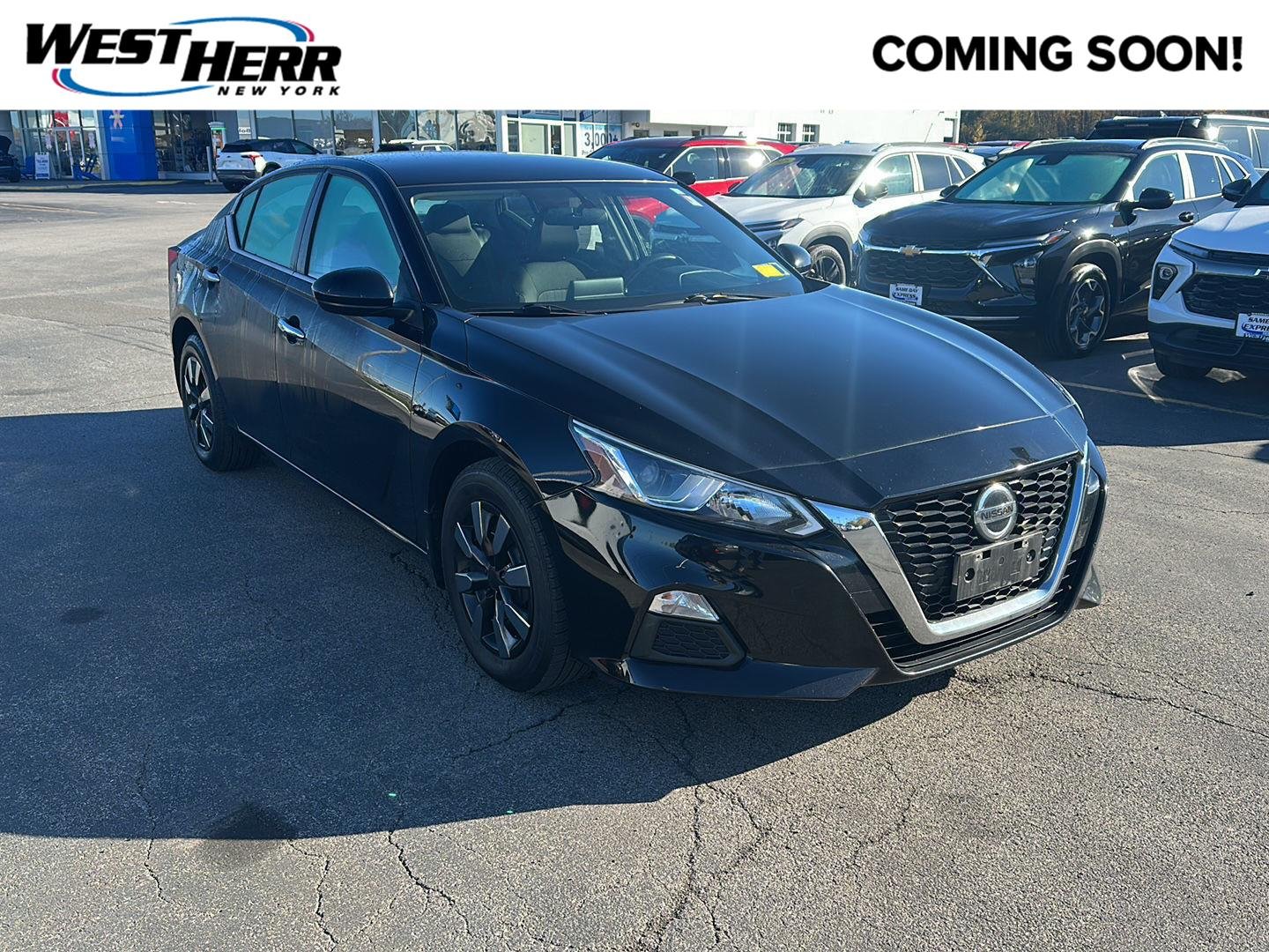 Used 2019 Super Black Nissan 2.5 S image 1