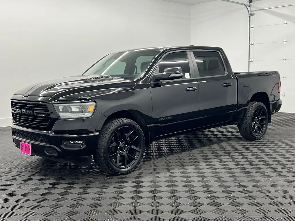 Certified Used 2024 Diamond Black Crystal Pearlcoat Ram Laramie image 1