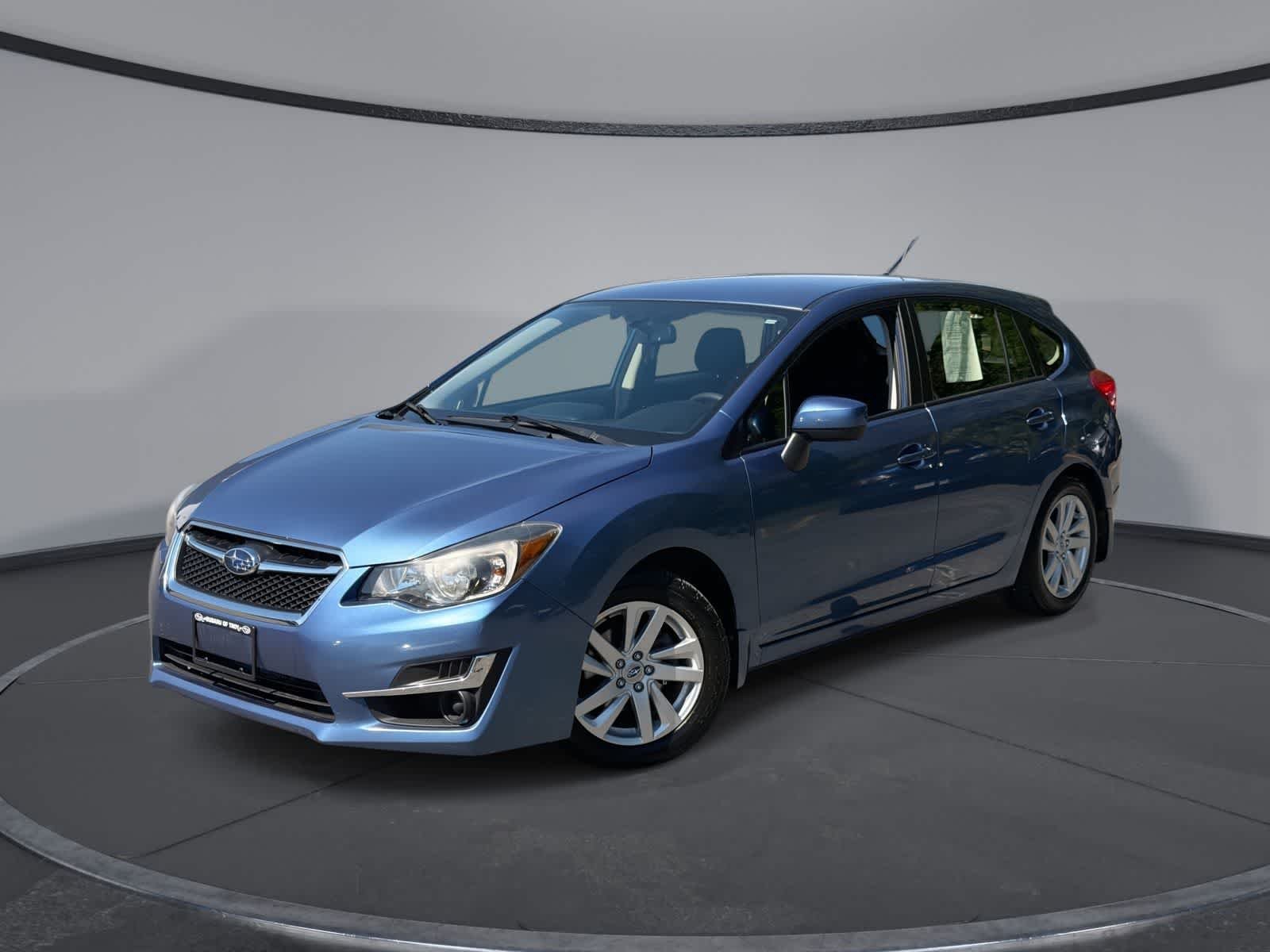 Used 2016 Quartz Blue Pearl Subaru 2.0i Premium image 1