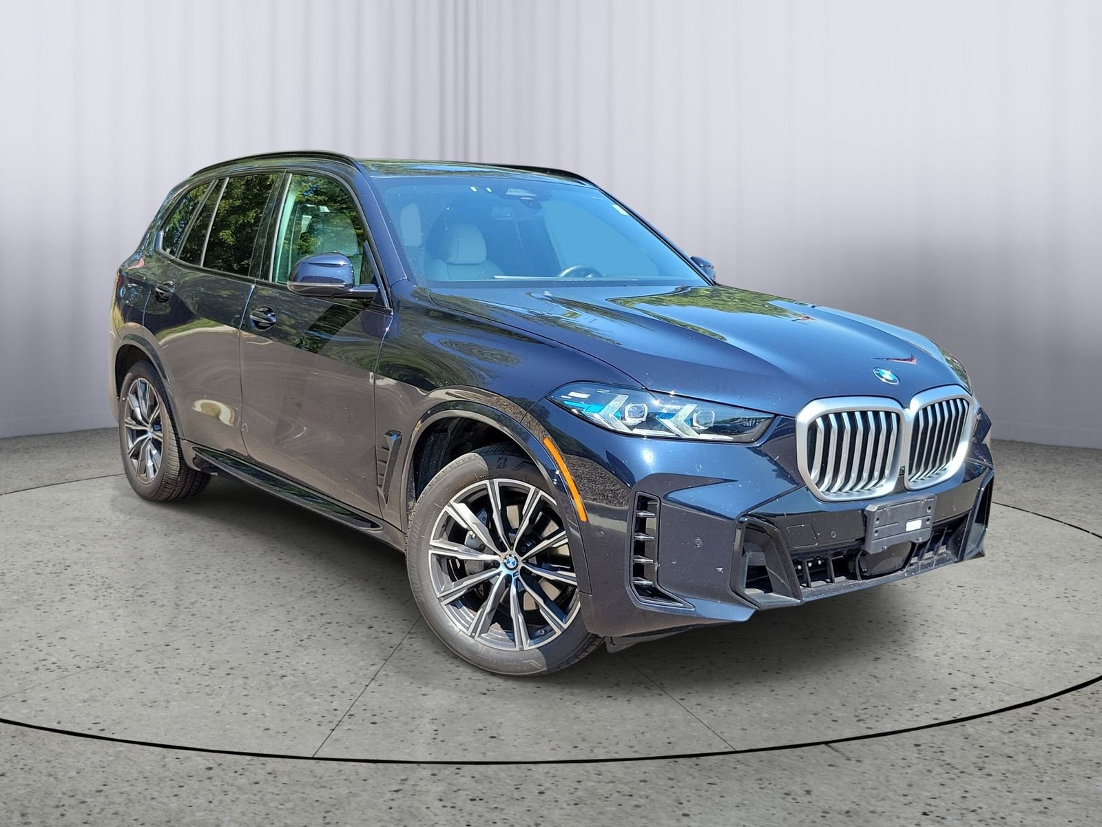 Used 2024 Black BMW xDrive40i image 1