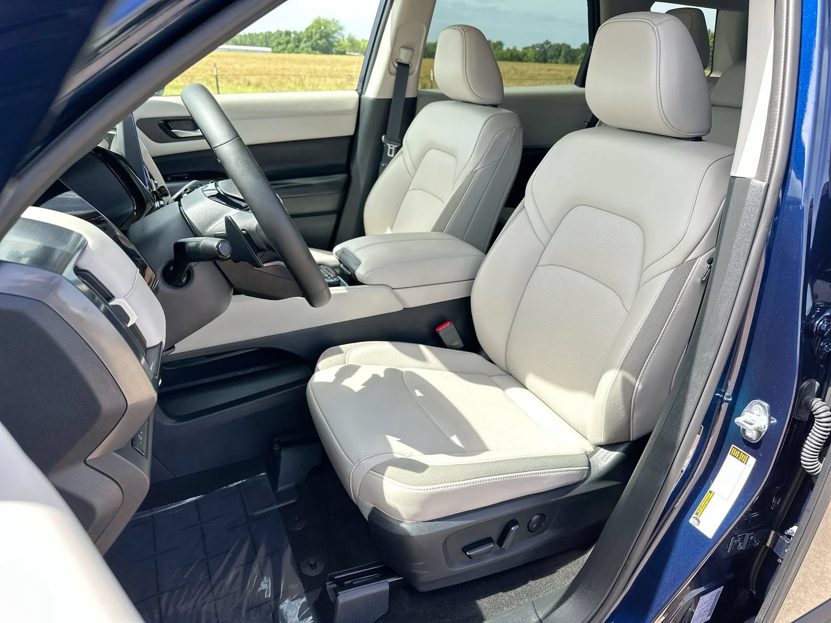 Used 2026 Deep Ocean Blue Pearl Nissan SL image 11