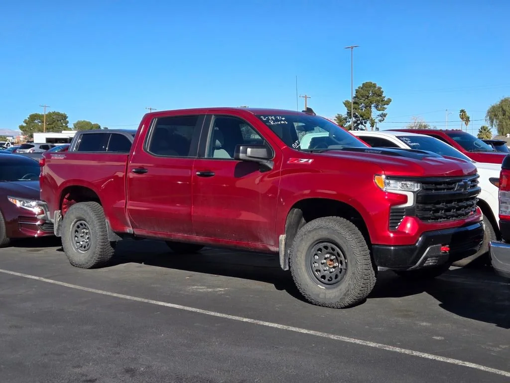 Used 2024 Radiant Red Tintcoat Chevrolet LT Trail Boss image 1