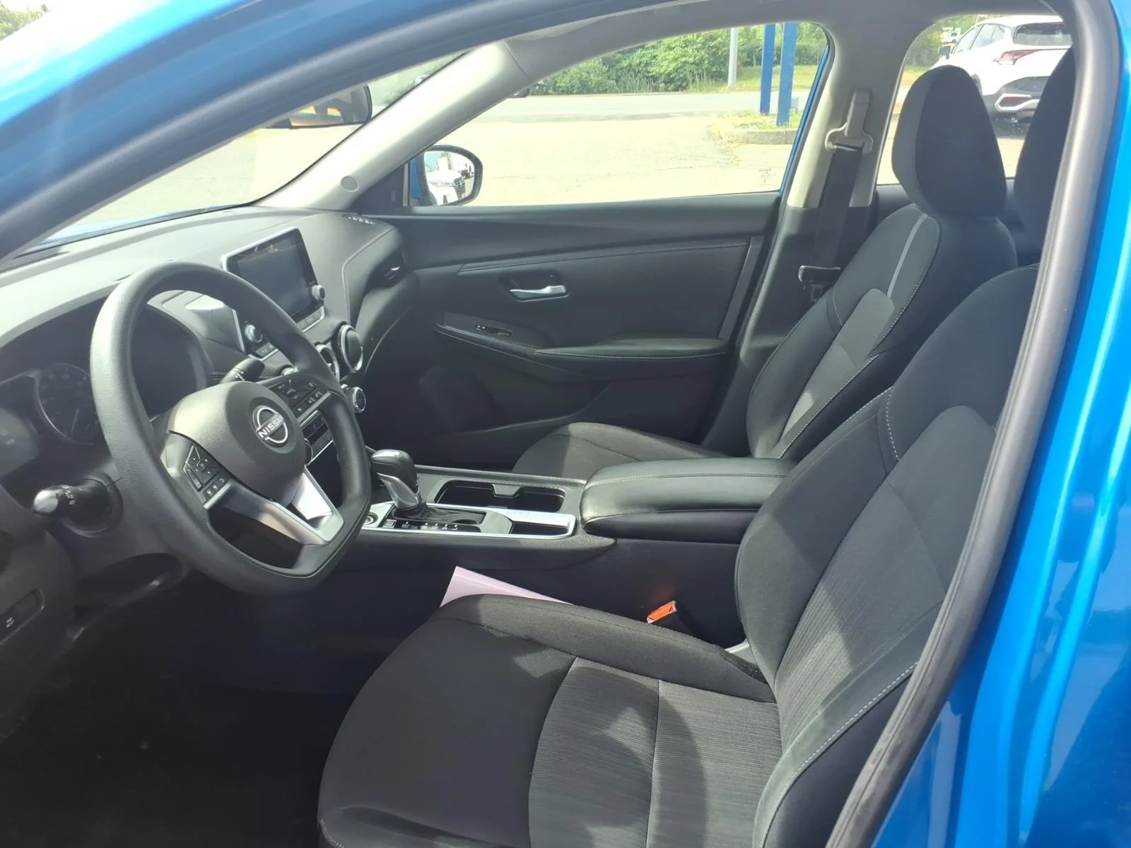 Used 2025 Electric Blue Metallic Nissan SV image 14
