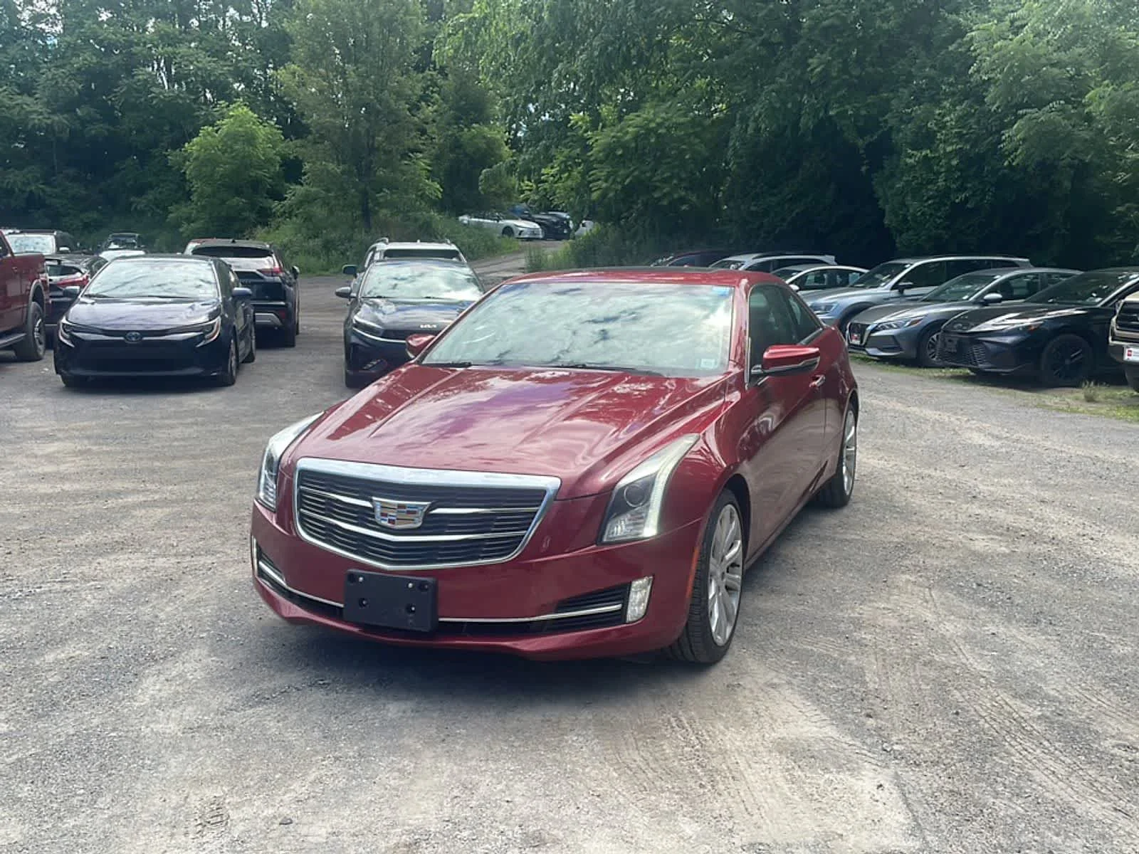Used 2016 Red Obsession Tintcoat Cadillac Luxury Collection AWD image 1