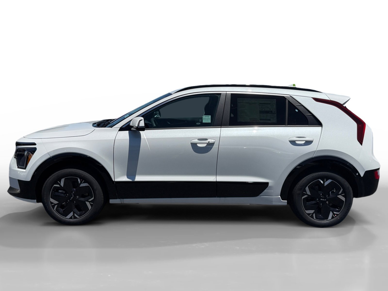 New 2026 Snow White Pearl Kia WIND image 2