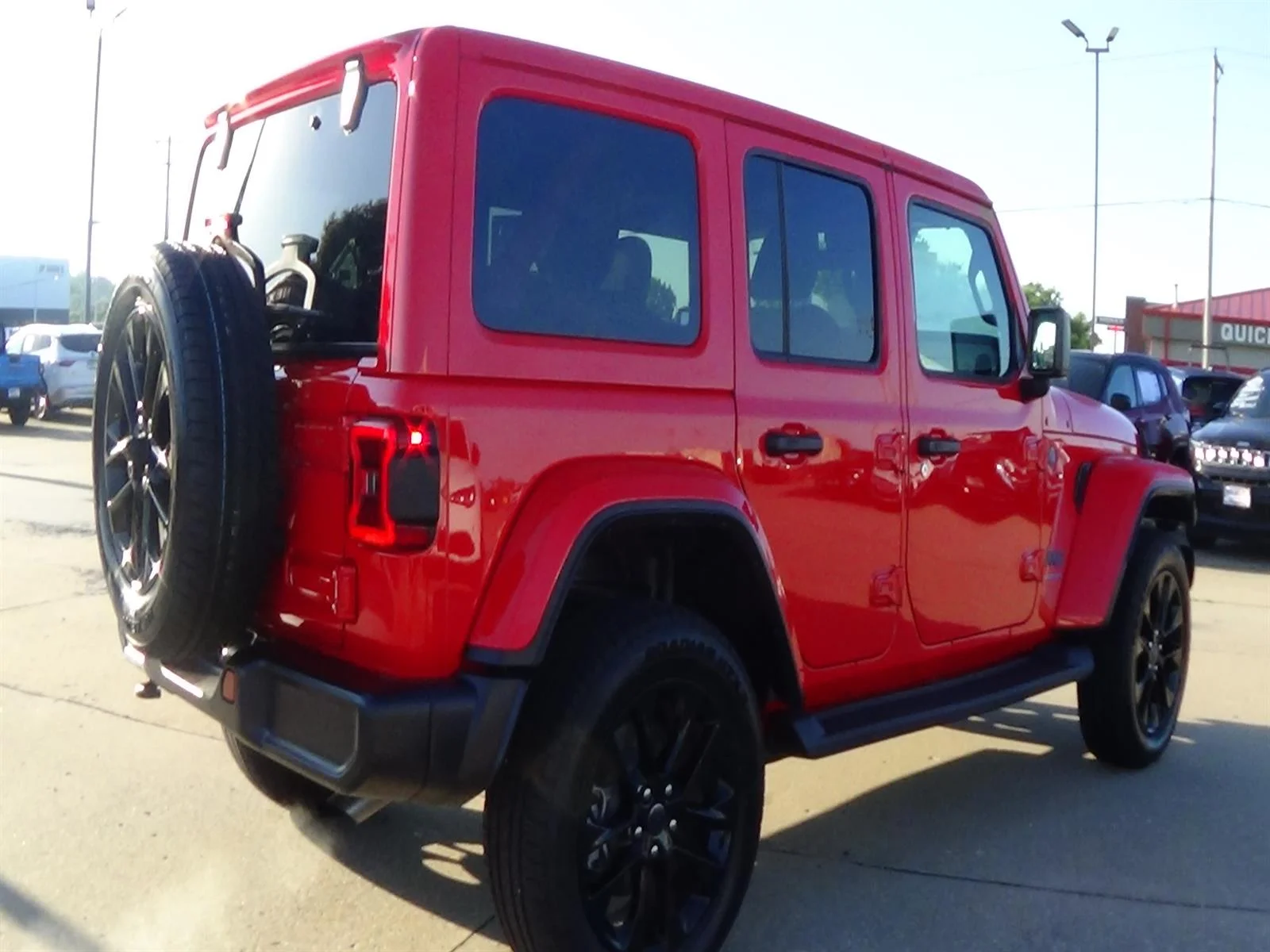 Used 2025 Firecracker Red Clear Coat (prc) Jeep Sahara 4xe image 6