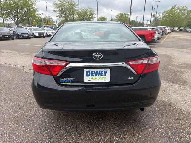Used 2016 Midnight Black Metallic Toyota LE image 4