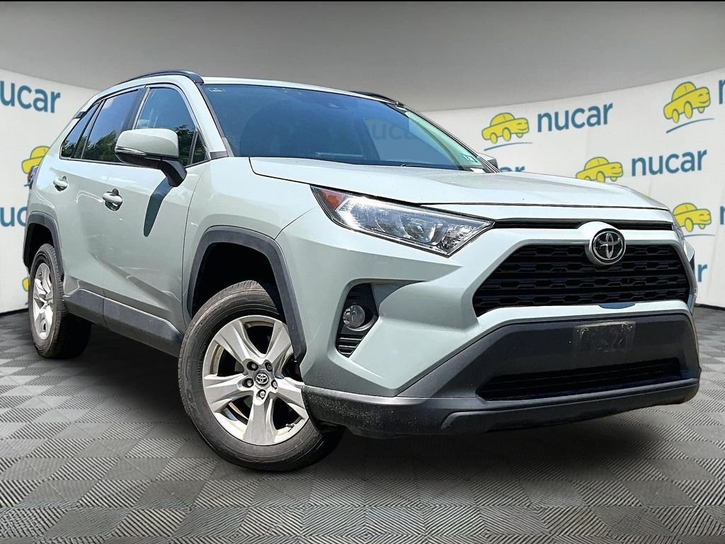 Used 2021 Blue Toyota XLE image 1