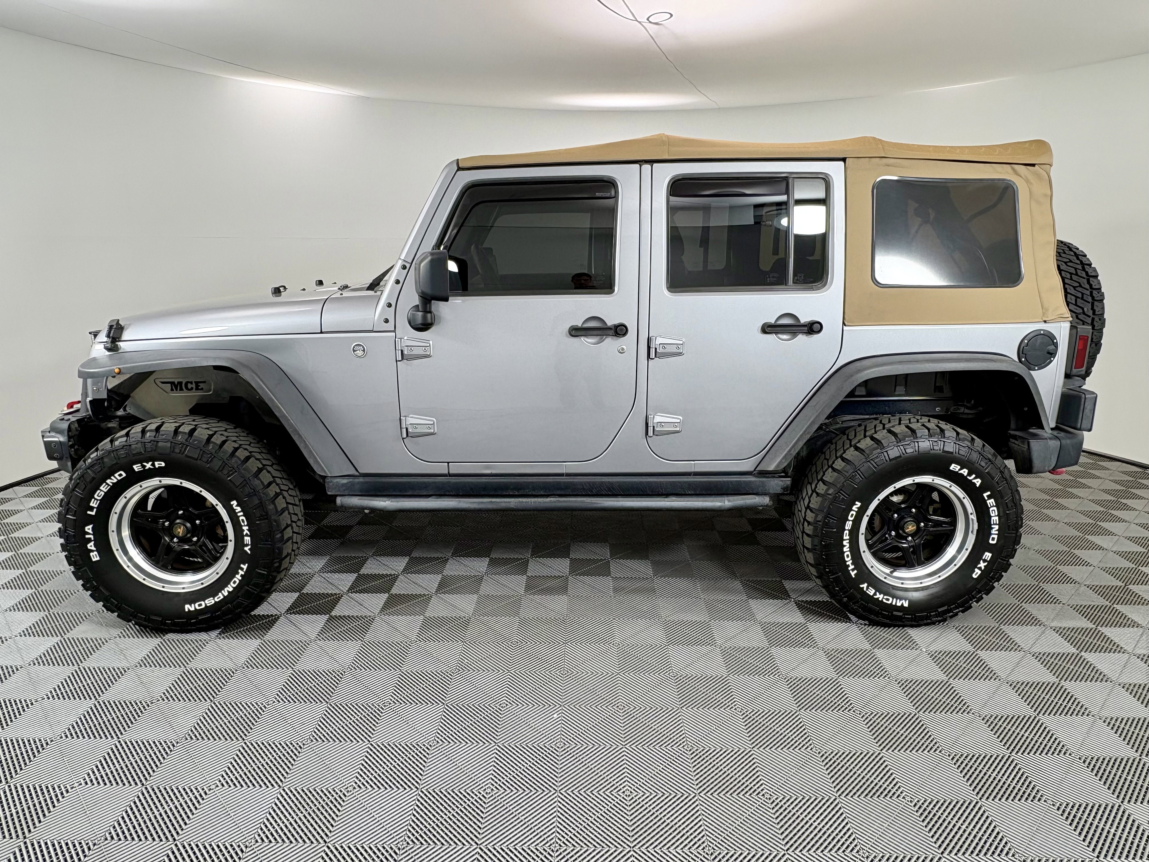 Used 2015 Jeep Wrangler Unlimited Sport with VIN 1C4BJWDG9FL610020 for sale in Queen Creek, AZ