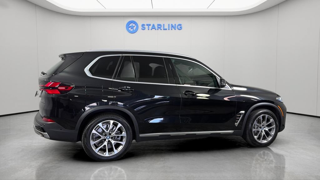 Used 2025 Black BMW xDrive50e image 10