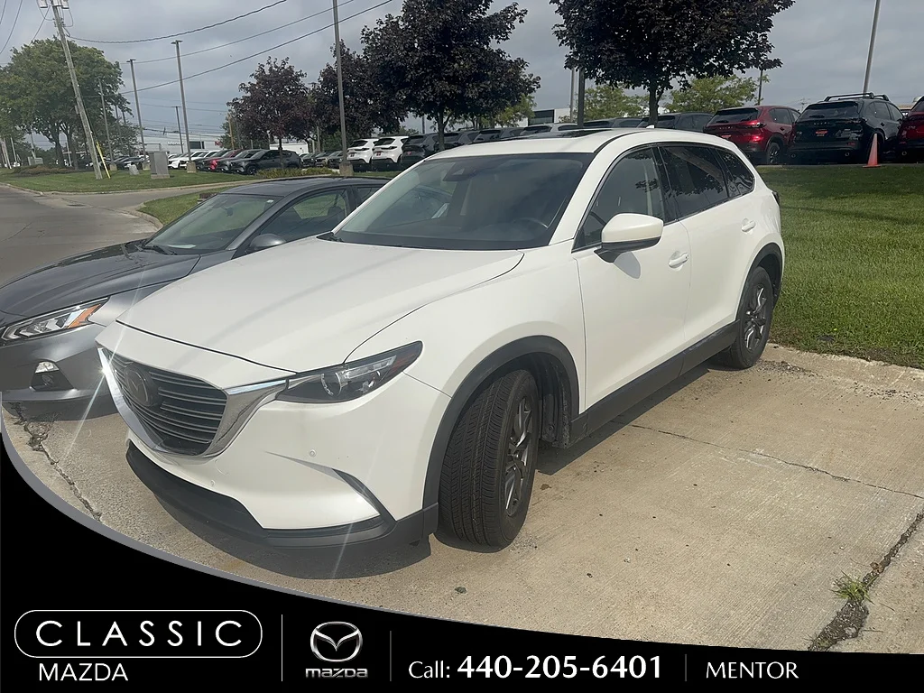 Used 2021 Snowflake White Pearl Mica Mazda Touring image 1